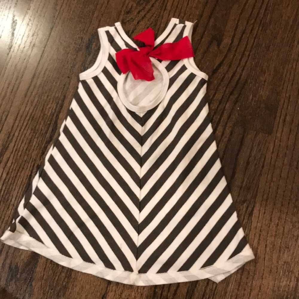 Asymmetric striped dress w/ keyhole & bow on back